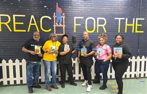  Dixon staff holding books